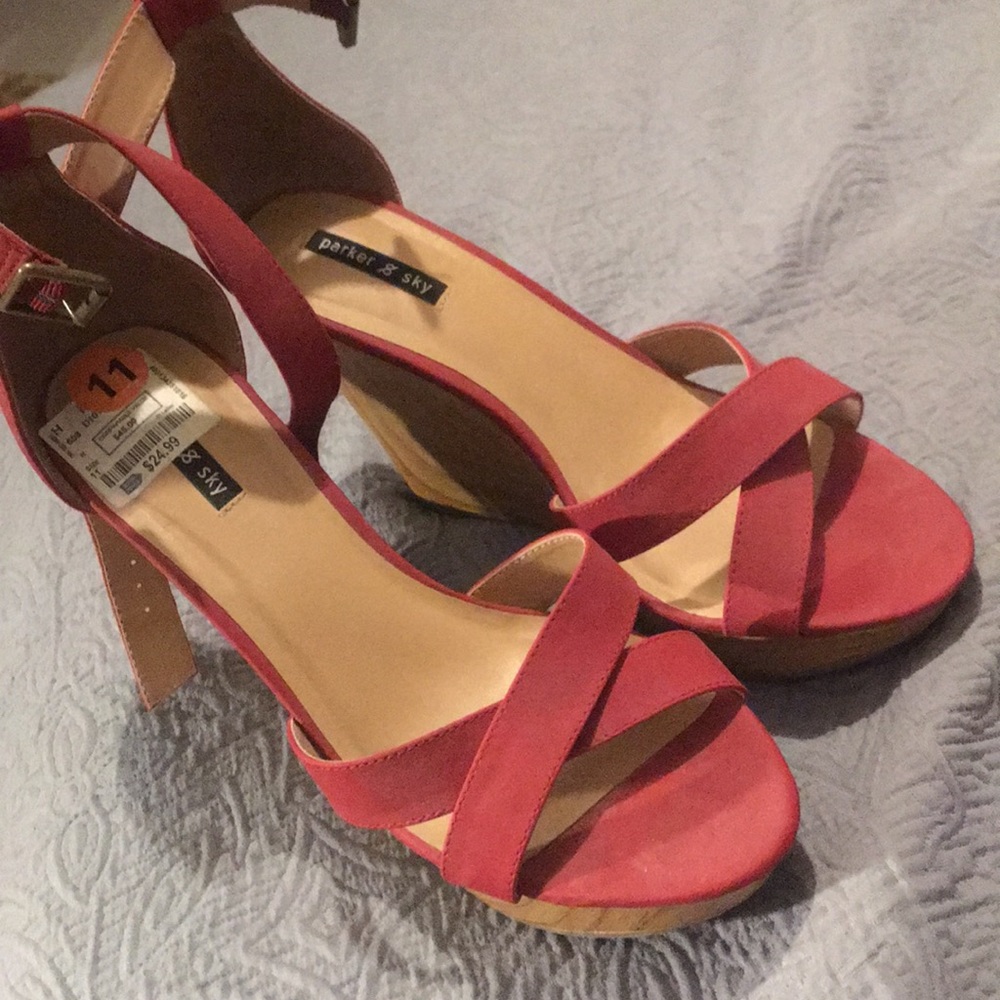 A red wedge heel sandal. Size 11